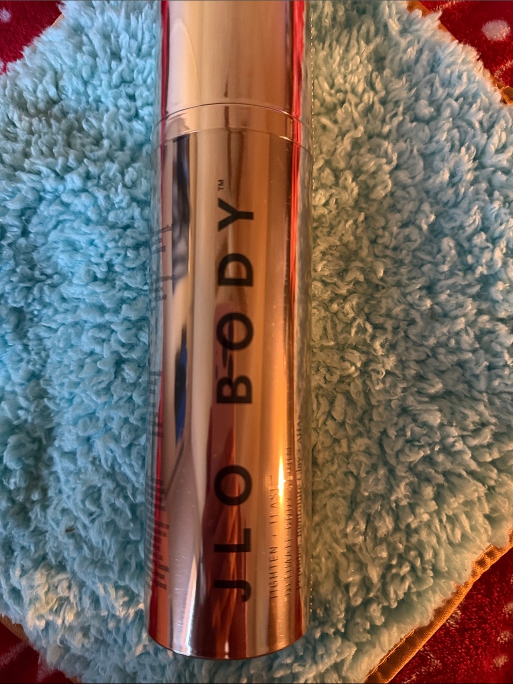 JLO body tighten & tease ultimate body serum, peptides, bentonite clay & ahas